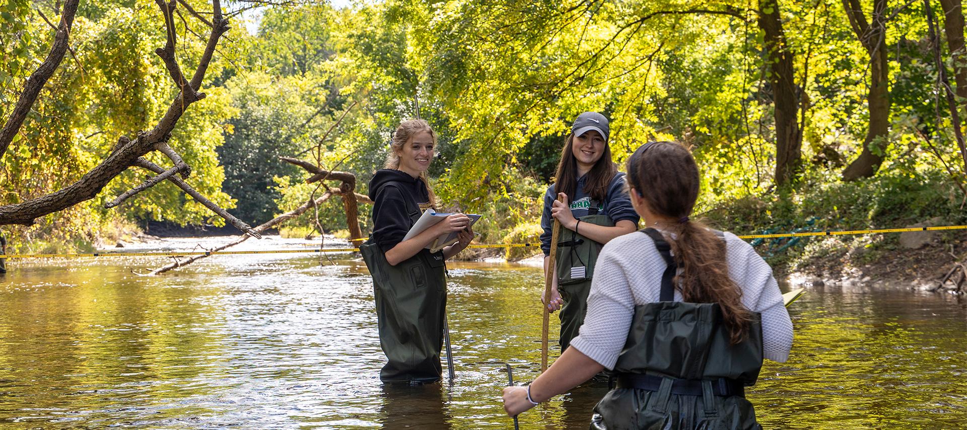 Marine biology students in river